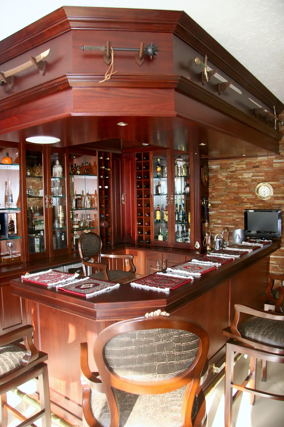 Bar counter beneath the mahogany canopy
