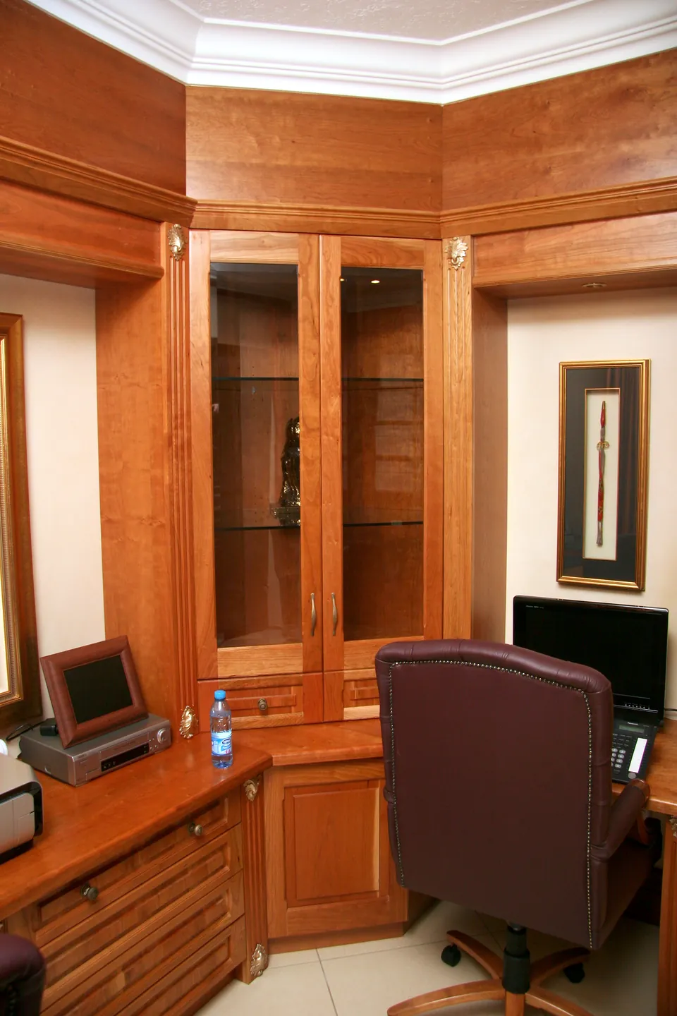 Corner of the cherry study with display cabinets
