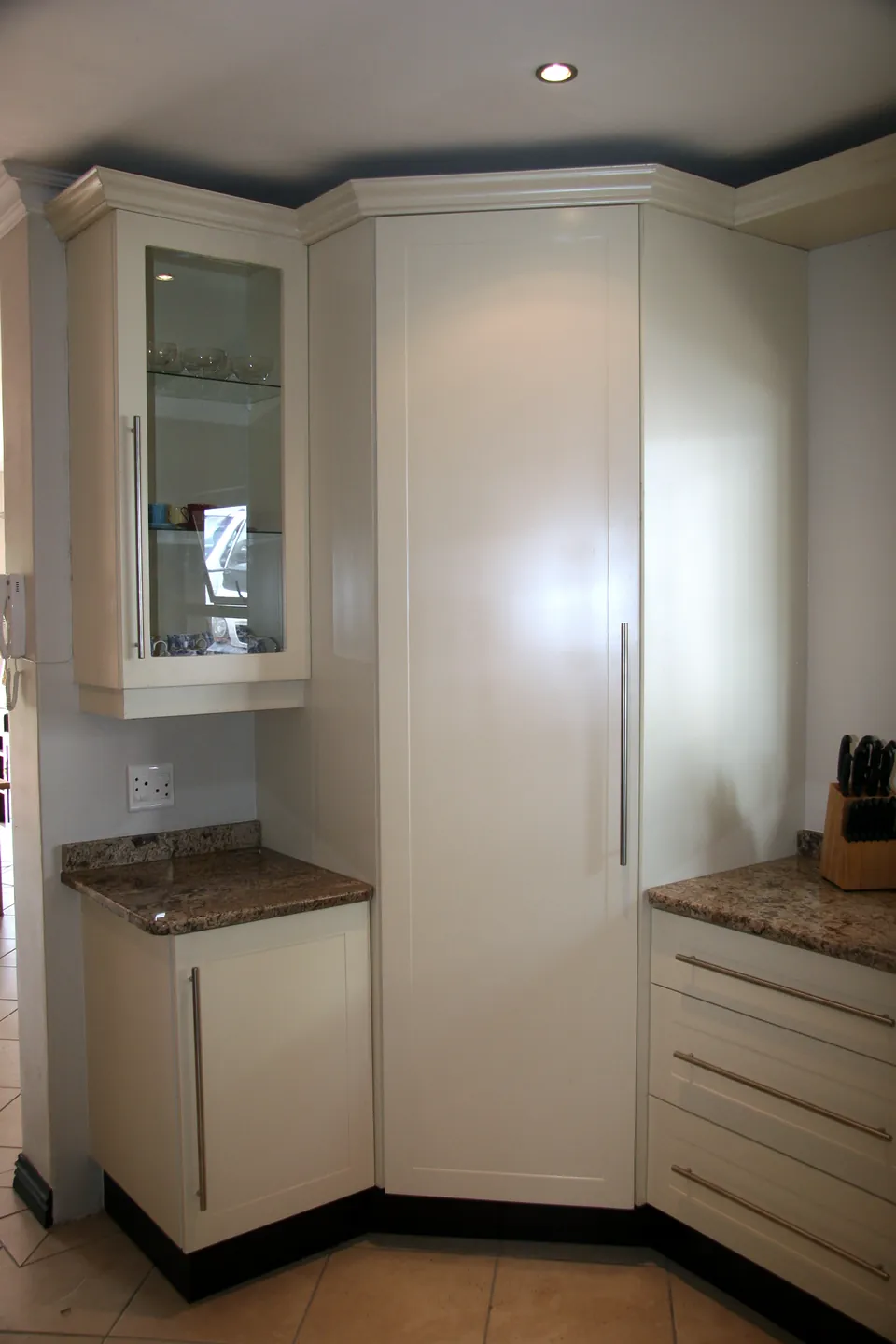 Corner pantry and glazed wall cabinet
