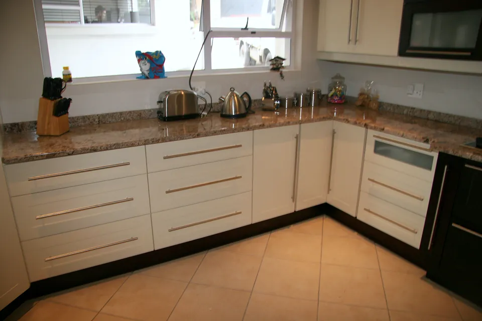 Window run of drawers and cupboards