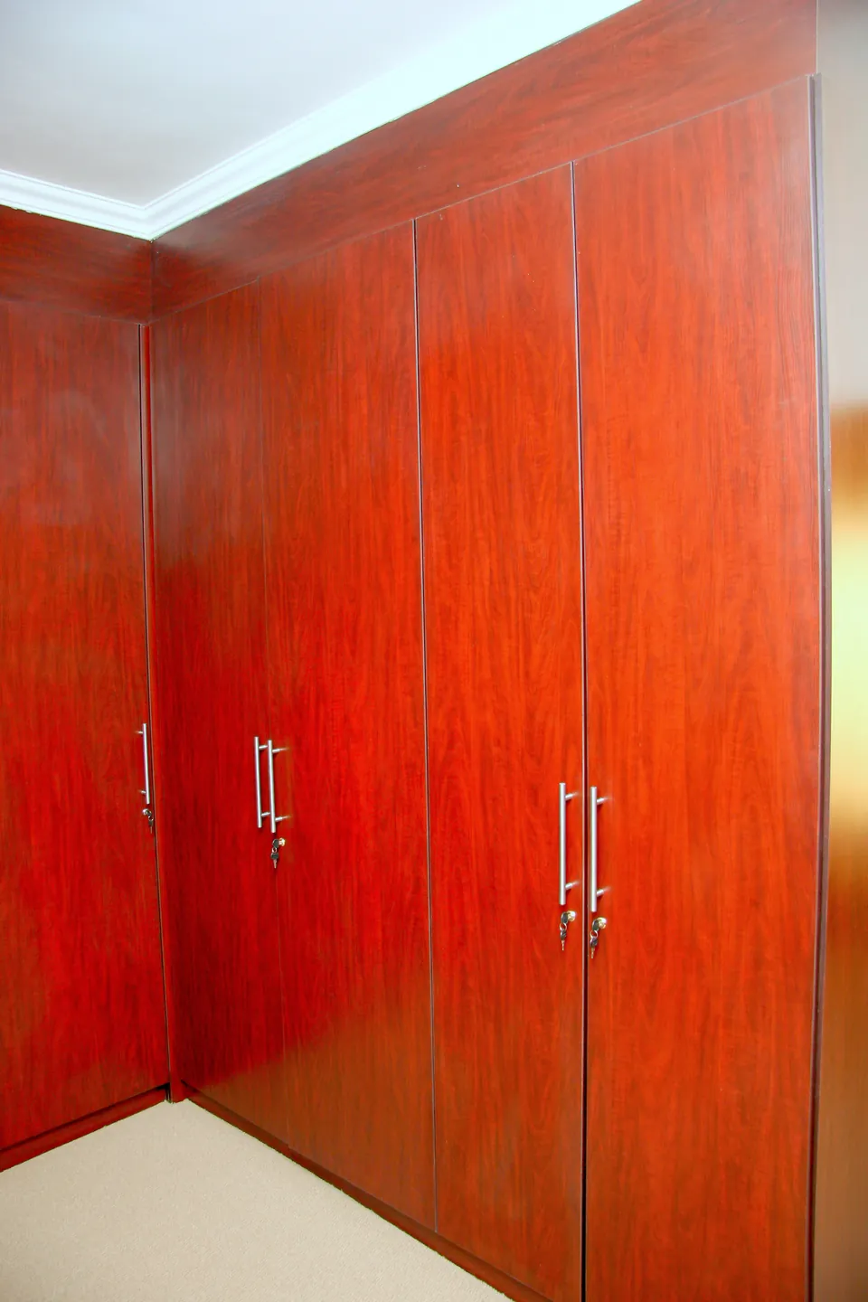 Built-in cupboards with full-height doors