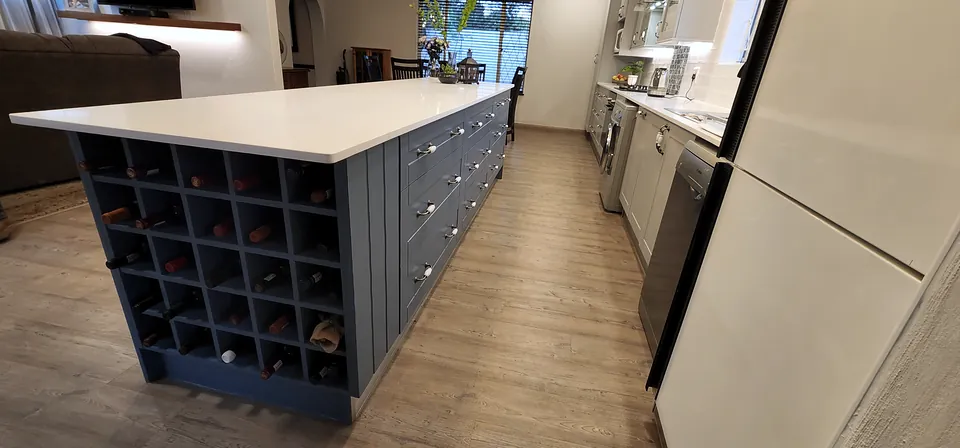 Wine rack built into the end of the island