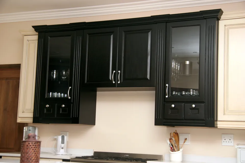 Black glazed wall units over the range